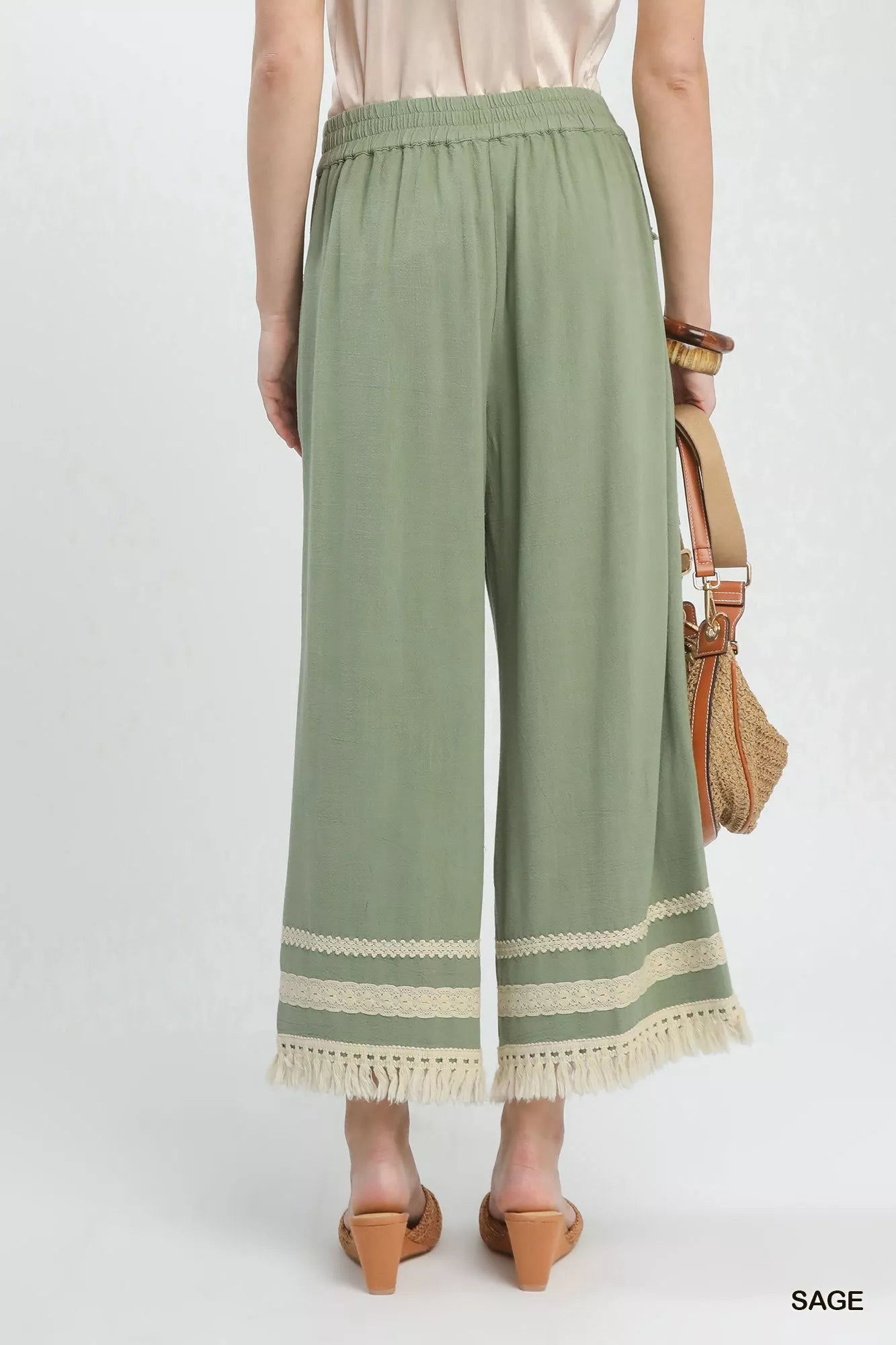 Sage-colored Umgee lace trim fringe hem wide-leg linen cotton pants