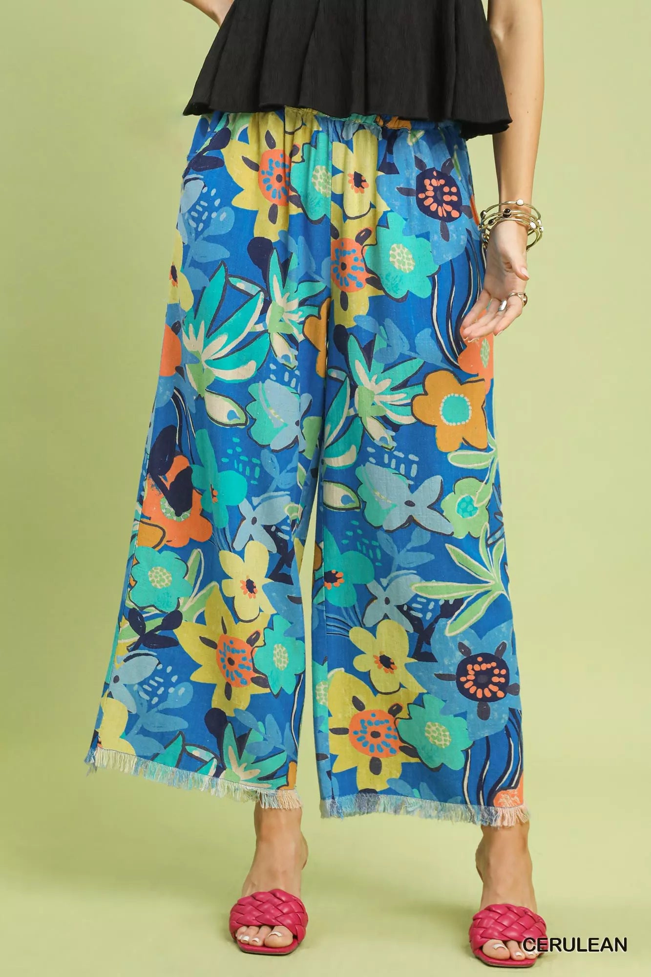Umgee floral print wide-leg pants with blue flowers and frayed hems
