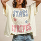 BiBi Mix And Match Stars And Stripes Patchwork Short Sleeve T-Shirt, cream-colored oversized with blue and red checkered, striped, and star patterns