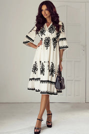 White and black floral print half sleeve knee length dress