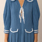 Peter Pan collar tie-front pleated three-quarter sleeve mini dress in blue ribbed cotton with sailor collar and white trim