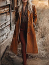 Women’s rust-colored suede fringe trim longline coat with frayed edges