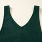 Dark green ribbed knit tank top with deep V-neck in jumpsuit