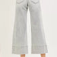 RISEN Tummy Control Mid Rise Crop Wide Pintuck Front Jeans in light-wash denim with rolled cuffs and back pocket