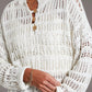 Button-detail knit cover up: white intricately knitted sweater with lace pattern
