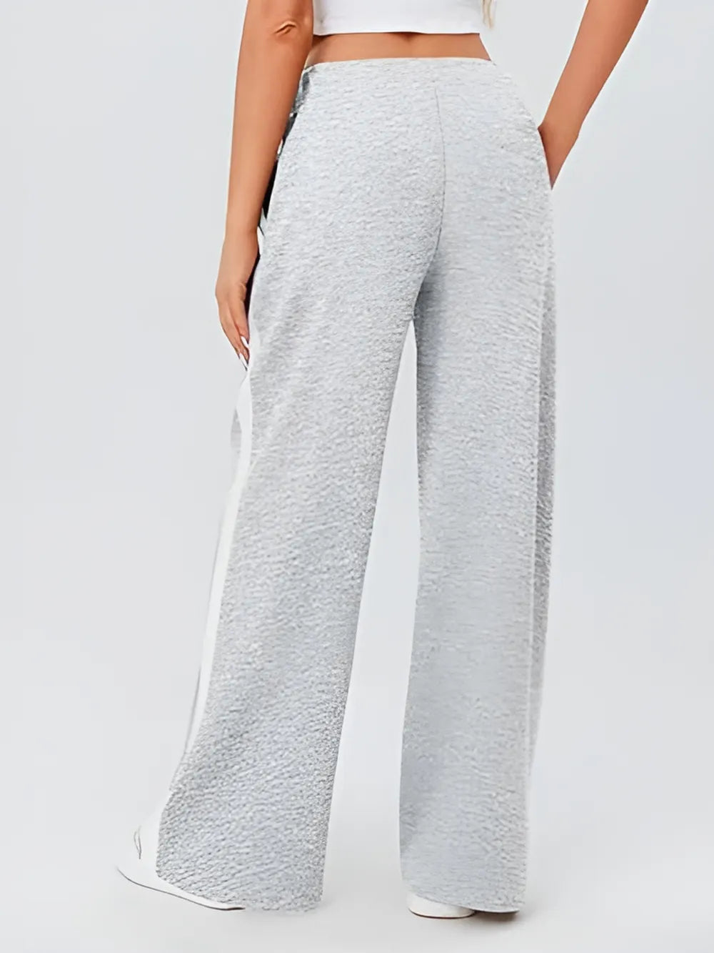 Light gray textured wide-leg sweatpants with white side stripe