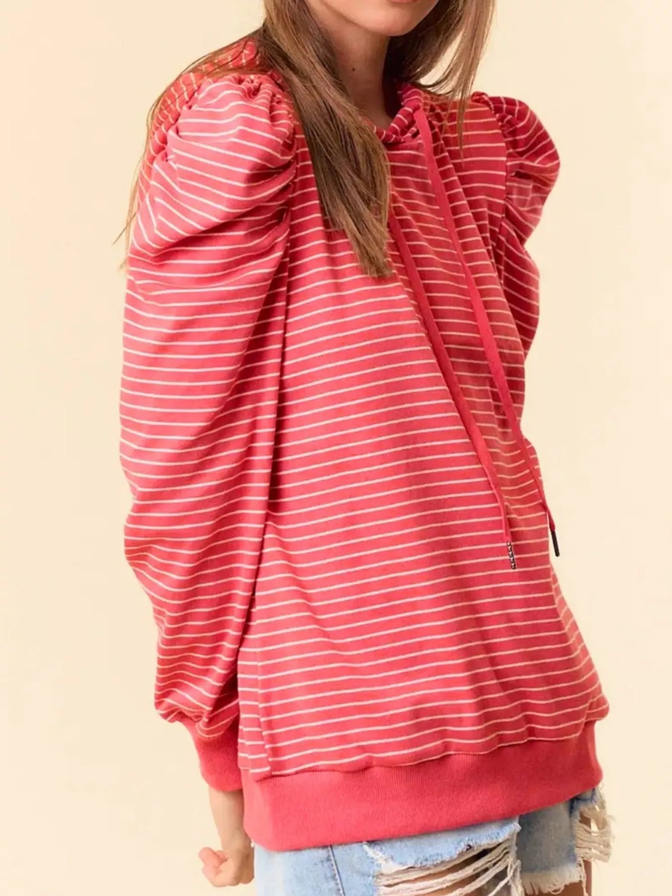 Coral striped hoodie with puffed sleeves and drawstring hood
