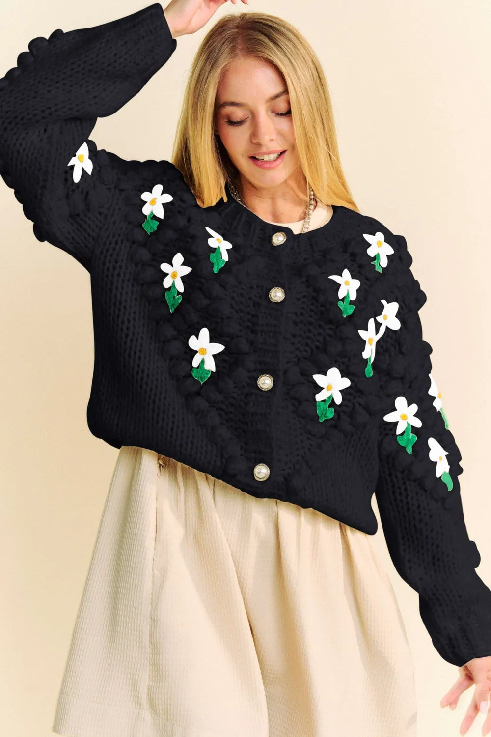 Black Davi & Dani knitted cardigan with white daisy and green leaf accents