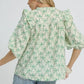 Umgee Ruffled Bow Print Notched Blouse - DAVERRI FASHIONS