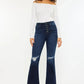 Kancan Button Fly High Rise Distressed Flare Jeans - DAVERRI FASHIONS