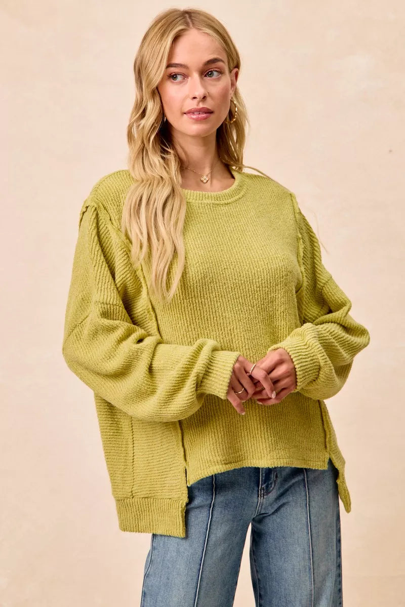 Cozy olive-green BiBi Boucle rib knit sweater with uneven hem