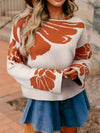 Boho flower pattern oversized knit sweater in cream with rust-orange florals and bell sleeves