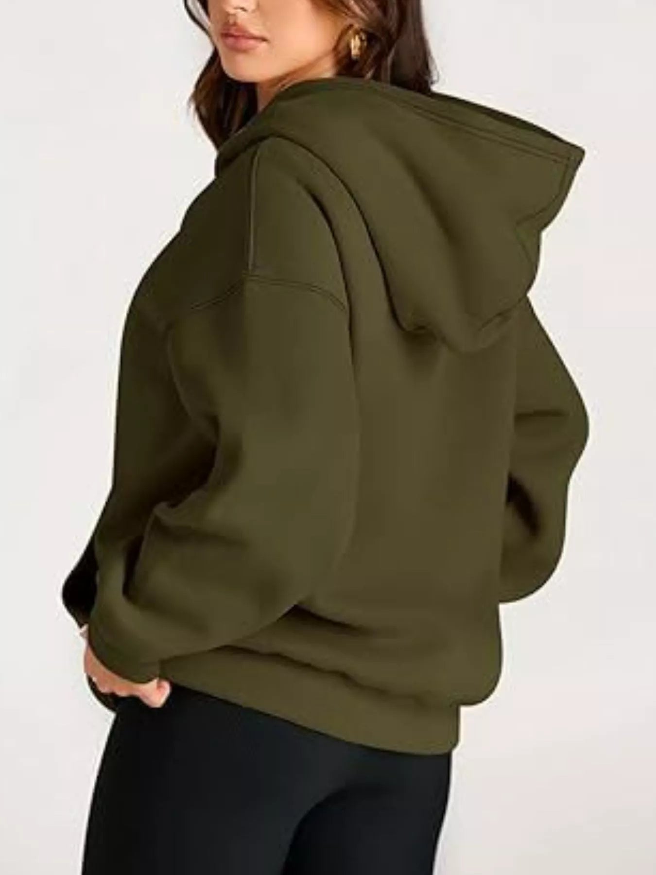 Olive green oversized kangaroo pocket hoodie with relaxed fit and ribbed cuffs