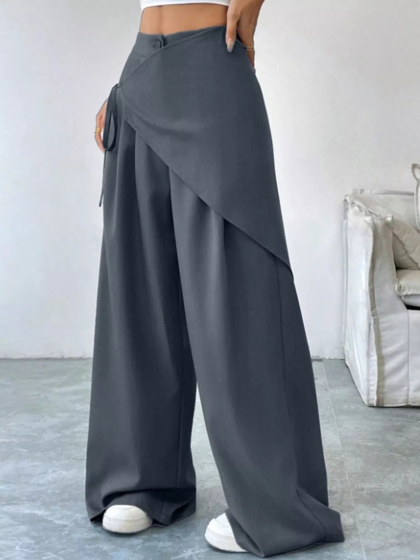 Daverri wrap-front wide-leg pants in dark gray with draped asymmetrical front and side ties