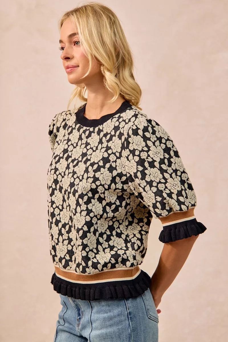 Black and cream floral BiBi Textured Rose Knit Top with ruffled sleeves