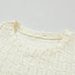 Daverri textured round neck knit top, cream with ruffled neckline