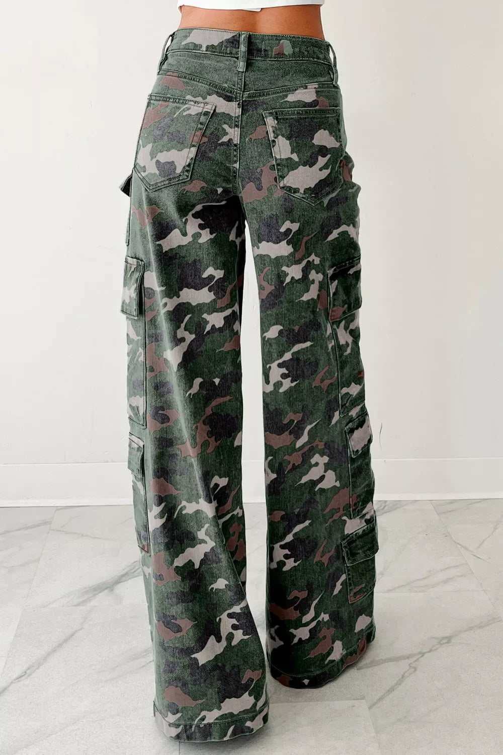 Camo print high-waisted denim cargo pants in green, brown, beige pattern