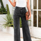 High-waisted dark wash wide-leg jeans with five-pocket design and rolled cuffs