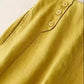 Daverri wide-leg pants back view in mustard-yellow satin with button waistband
