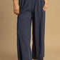 Navy blue Umgee high-waisted wide-leg linen pants with dotted pattern