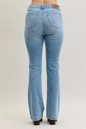 Light blue Judy Blue mid-rise bootcut jeans with brown leather patches