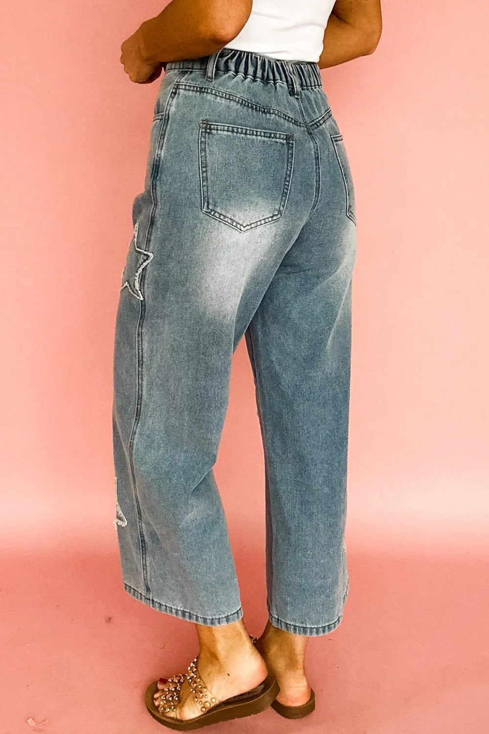 Star embroidered light-wash high-rise wide leg denim jeans