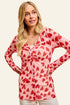 Pink long-sleeved BiBi button-down shirt with red heart mesh and ruched front