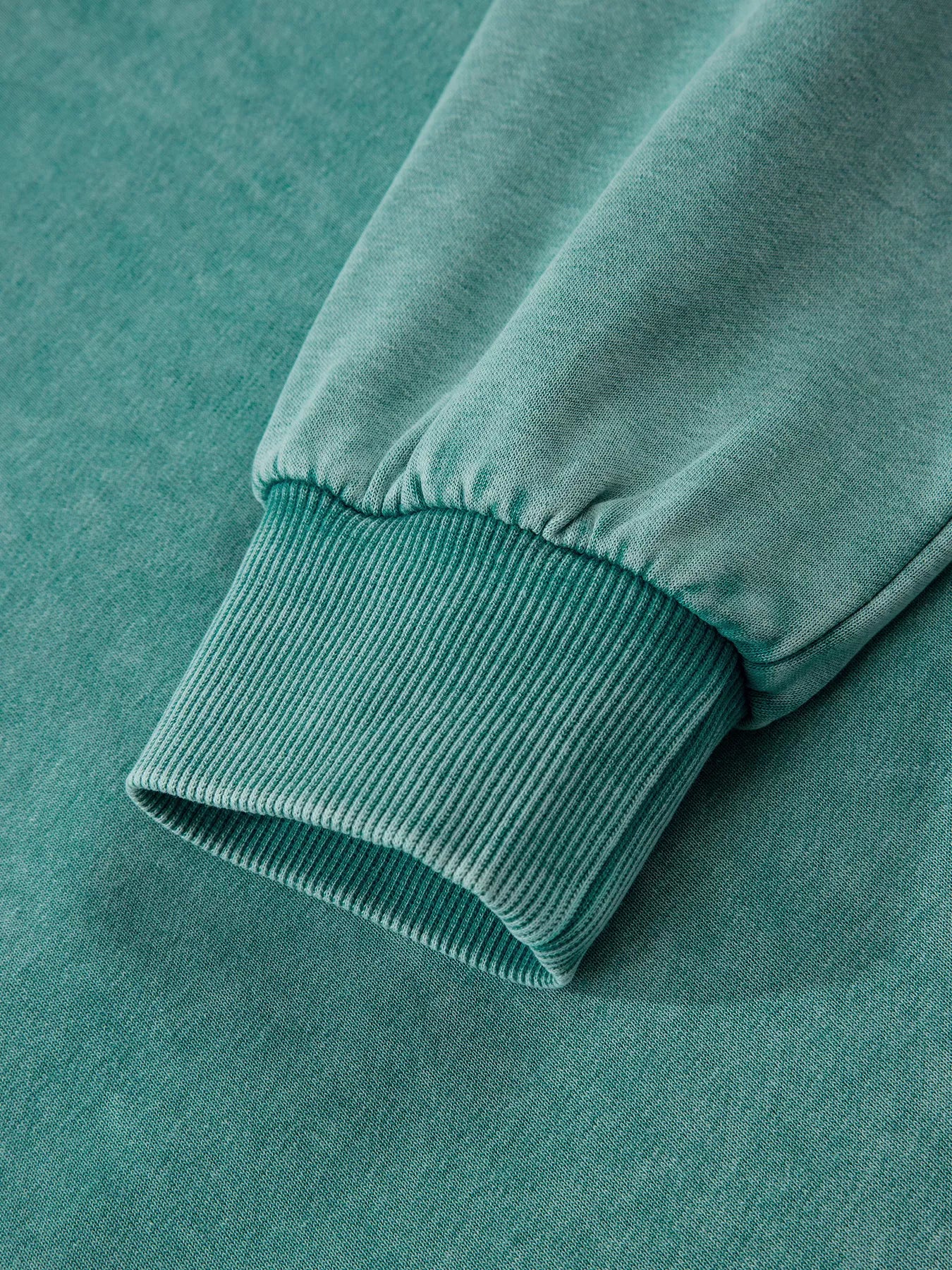 Teal mineral wash women’s half zip baggy hoodie with kangaroo pocket