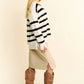 Woman in Davi & Dani high-low side slit striped johnny collar sweater