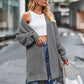 Gray long sleeve waffle-knit cardigan with textured open-knit pattern
