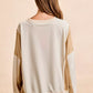Cozy BiBi French terry color block top in cream with beige sleeves