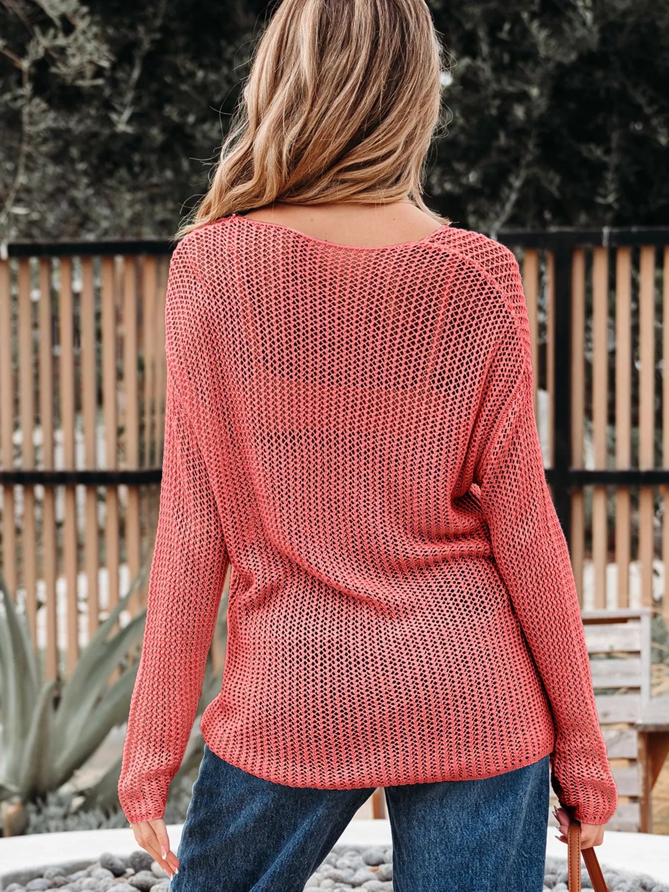 Coral crochet hollow out long sleeve knit top with openwork mesh pattern
