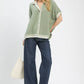 Mint Umgee linen button-front blouse with collar, sheer mint fabric and contrast piping