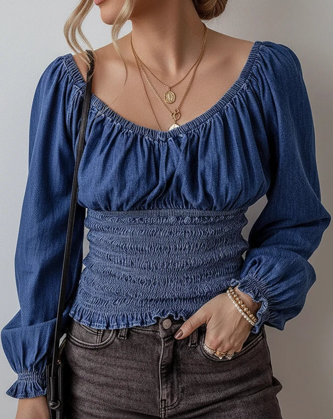 Blue denim blouse with puffed sleeves and smocked waist top