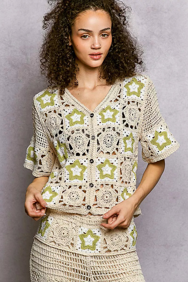 Cream crochet V-neck cardigan with green star patterns