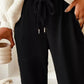 Daverri Fashions black corduroy pants with drawstring waist and silver aglets