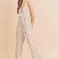 Aemi + Co Ditsy Floral Surplice Sleeveless Wide Leg Jumpsuit Jumpsuits