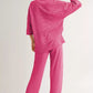 Vibrant fuchsia waffle-knit pajama set with buttoned shirt and wide-leg pants