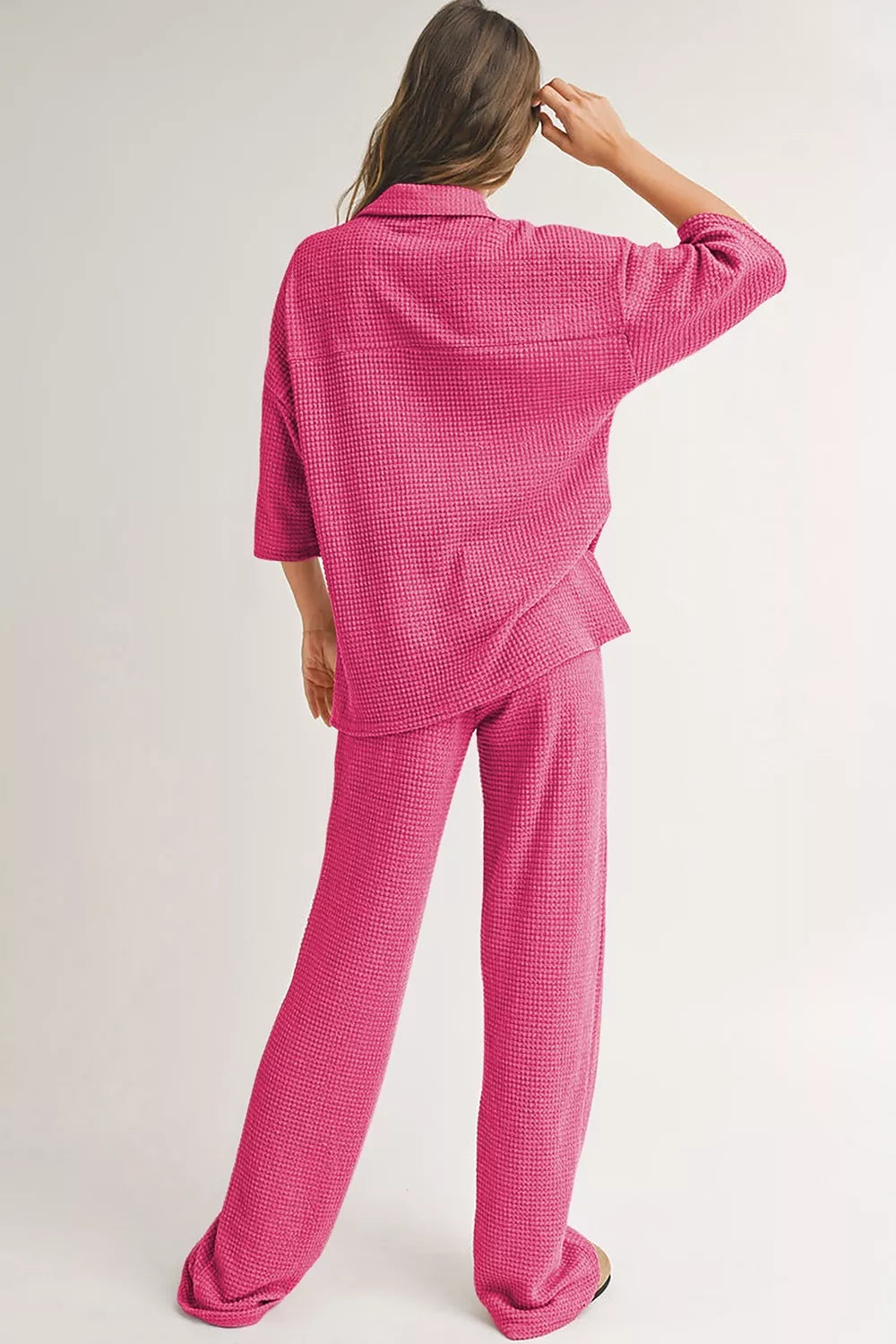 Vibrant fuchsia waffle-knit pajama set with buttoned shirt and wide-leg pants