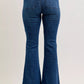 Back view of Judy Blue high-waisted flare jeans in blue denim with classic pockets
