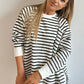Black and white striped oversized raglan sleeve sweatshirt with side slits