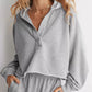 Gray Exposed Seam Dropped Shoulder Hoodie with half-zip front and ribbed cuffs