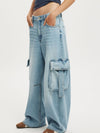 Vintage wash wide leg cargo jeans in light-wash denim with flap pockets