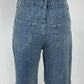 Frayed hem relaxed fit denim shorts back view with classic pockets