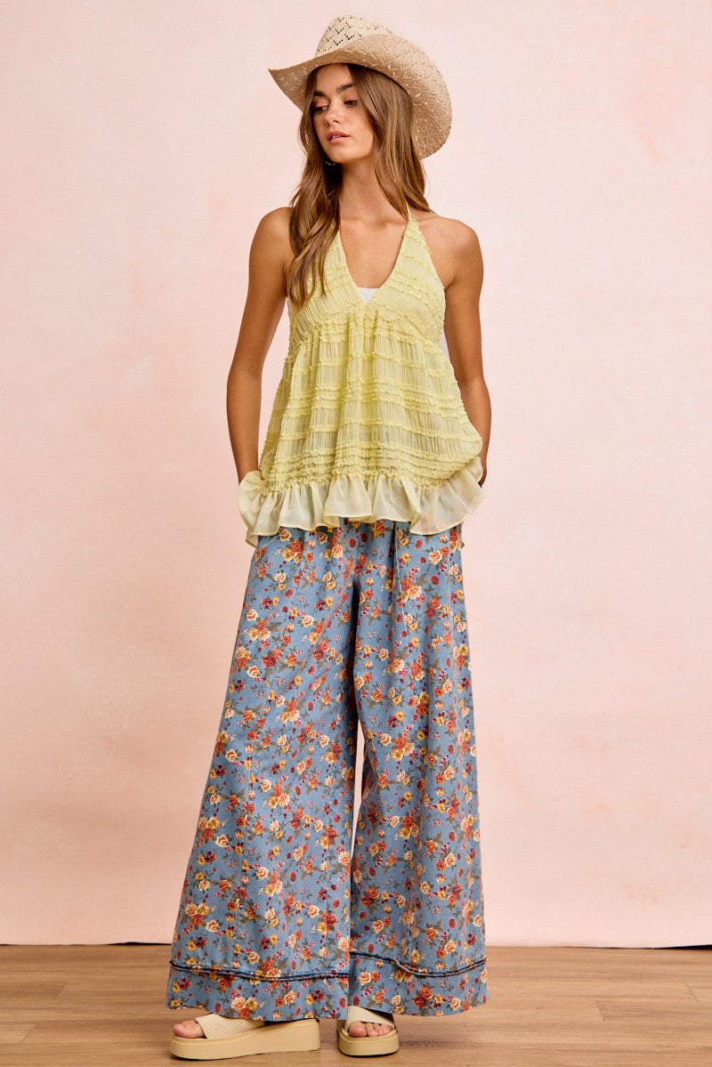 Light green ruffled halter top with BiBi floral pants