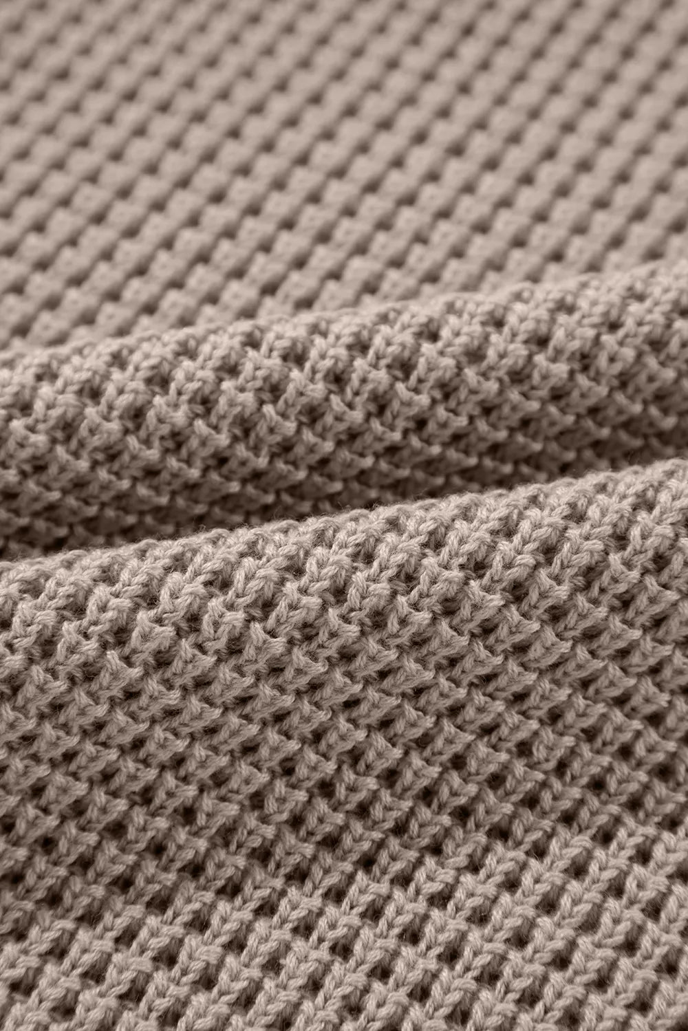 Beige waffle-knit fabric in striped checkered turtleneck sweater