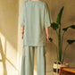 Sage green oversized top with ruched wide-leg pants by Davi & Dani