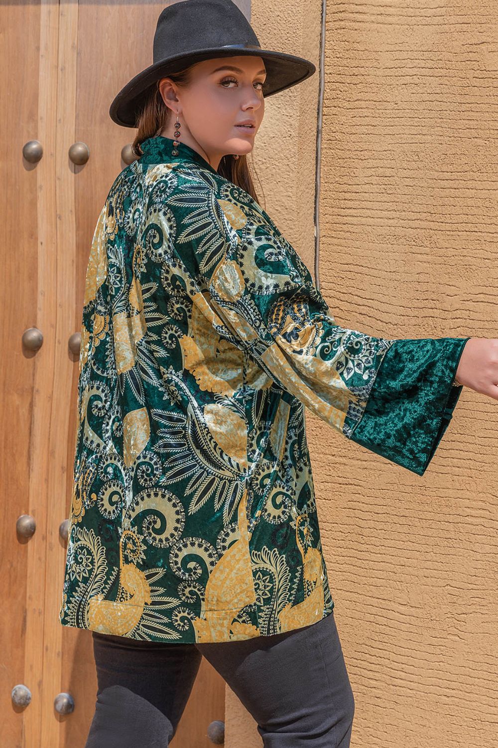 Plus size woman in green gold paisley velvet bohemian cardigan