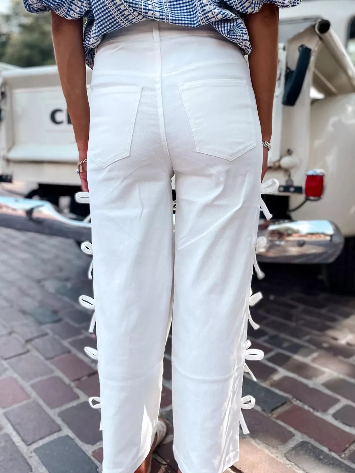 Daverri Fashions white denim wide-leg pants with lace-up sides