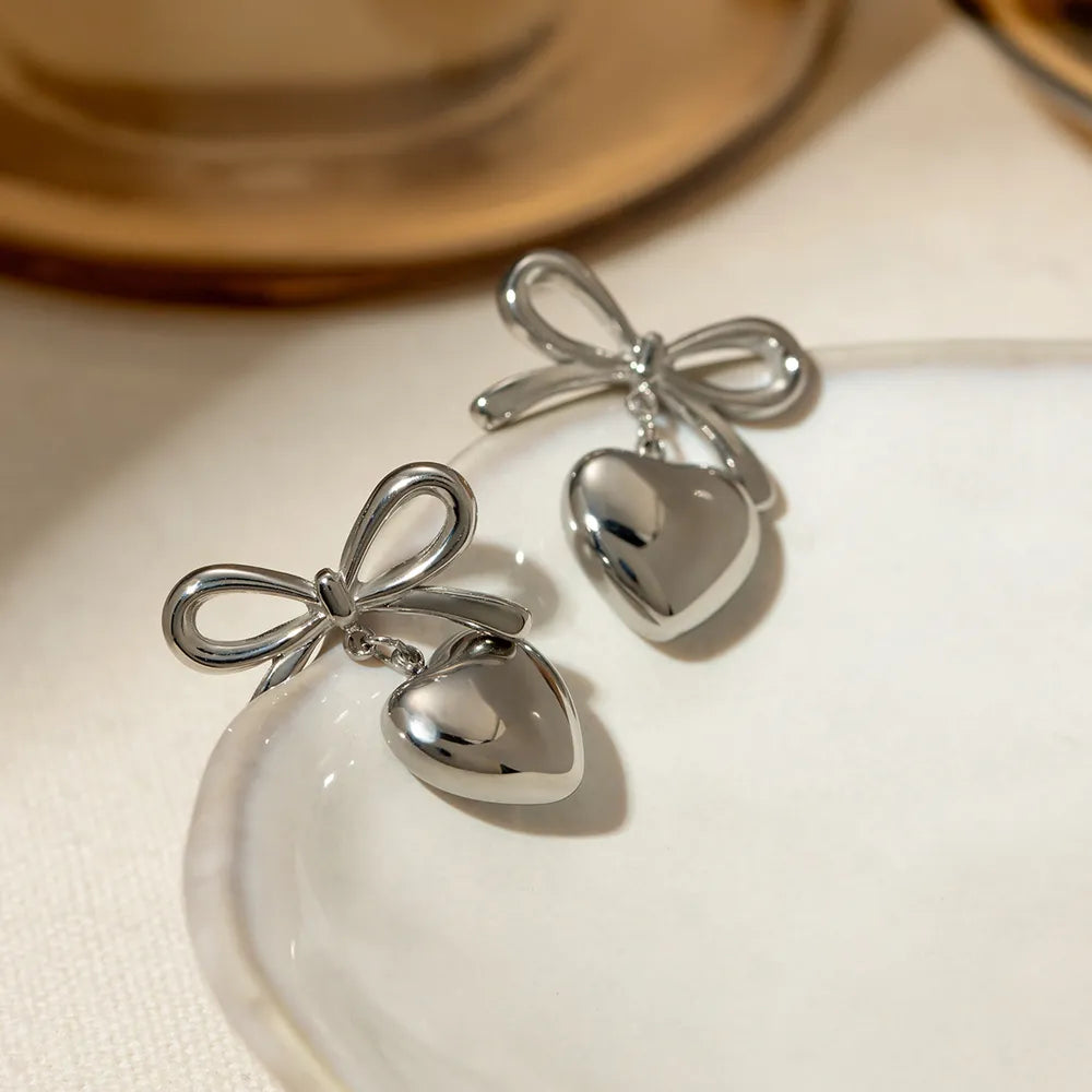 Stainless Steel Bow & Heart Drop Earrings | Earrings Daverri Fashions
